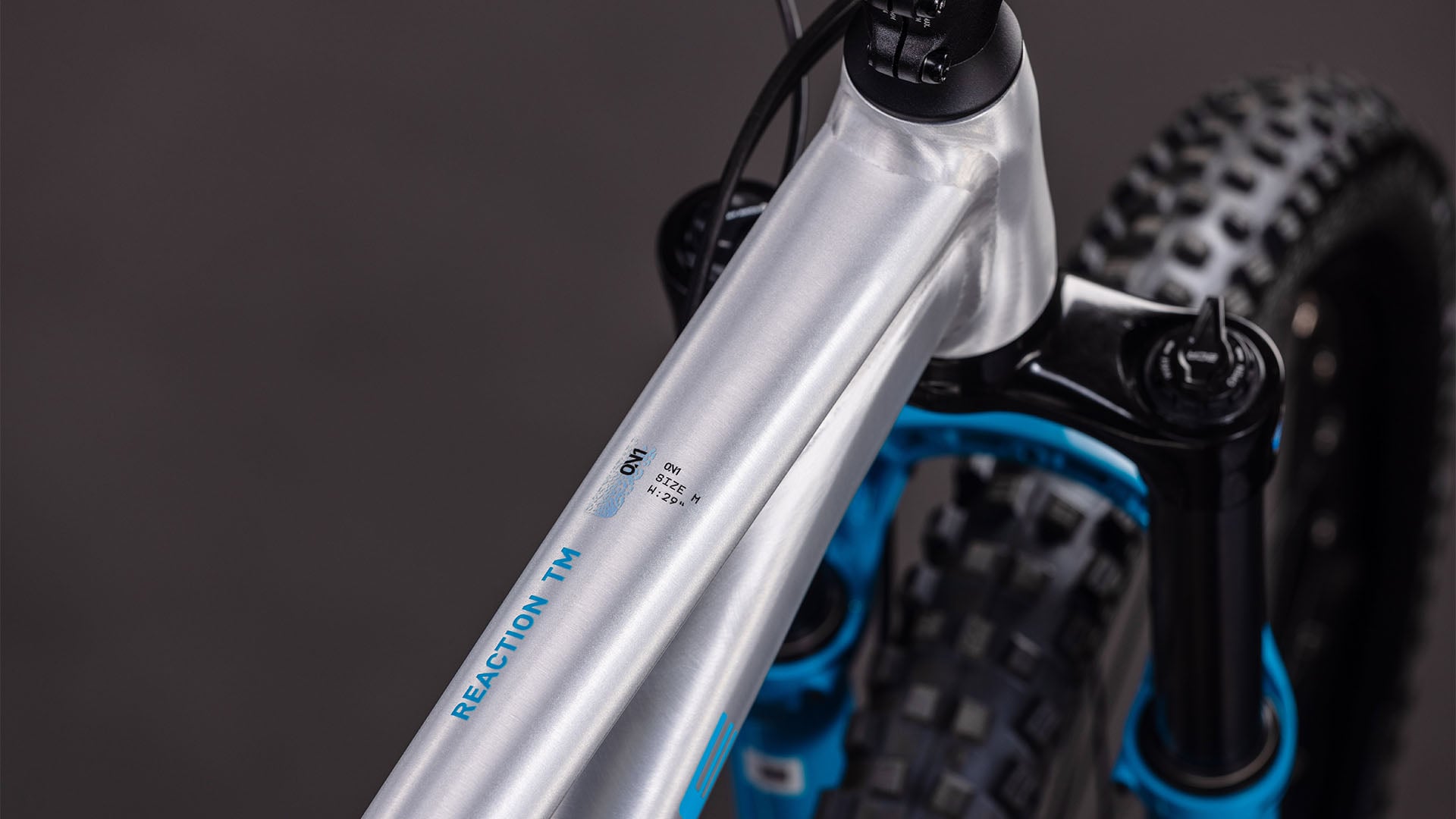 Bicicleta Cube Reaction TM ONE Rawmetal´n´Blue