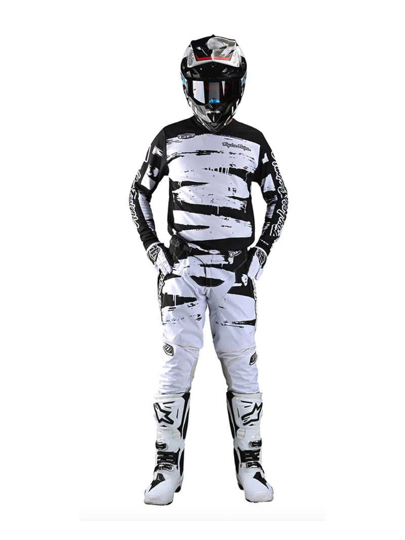 Troy Lee Designs Pantalones GP Brushed Negro / Blanco - Rideshop