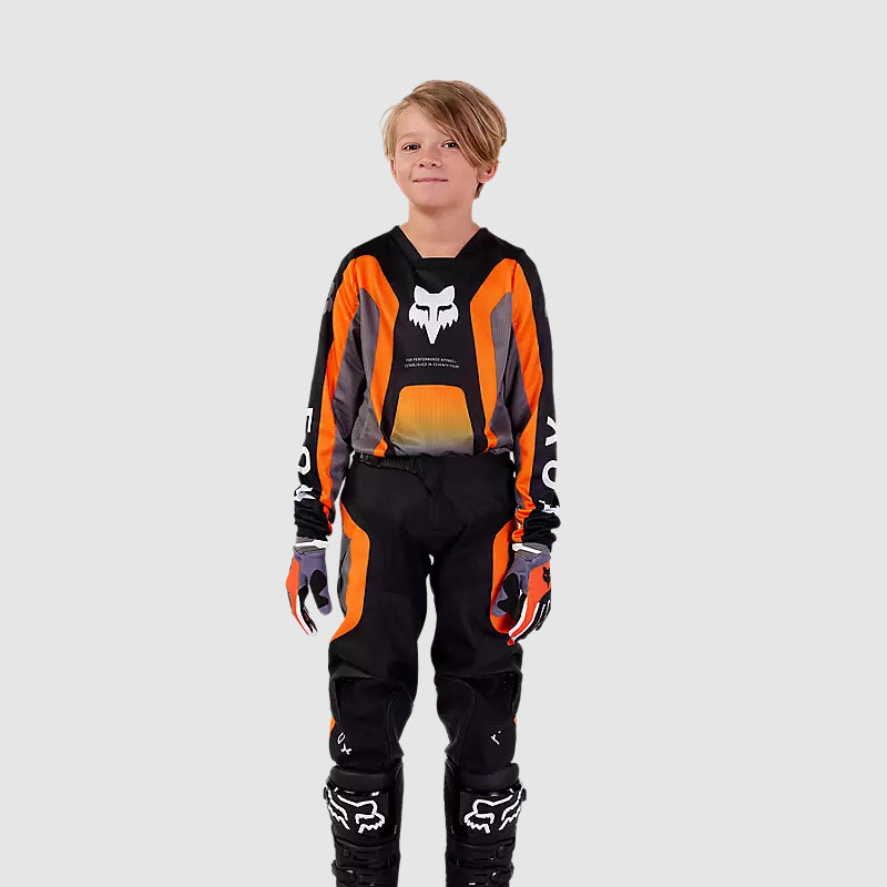 Polera Moto Niño 180 Ballast Negro/Naranjo Fox - Rideshop