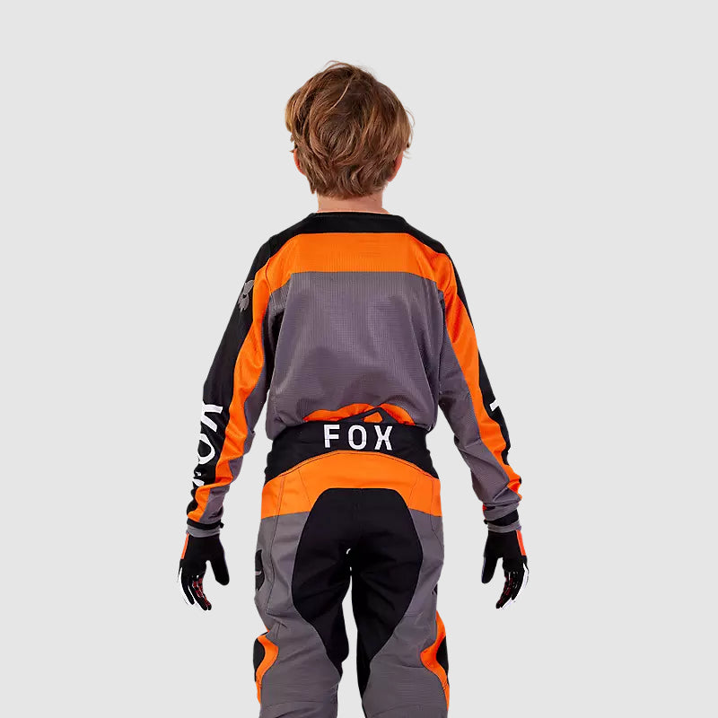 Polera Moto Niño 180 Ballast Negro/Naranjo Fox - Rideshop